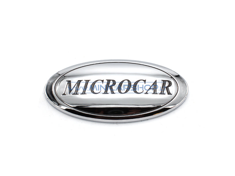 Kapoto/bagažinės dangčio logotipas Microcar MGO1 / MGO2